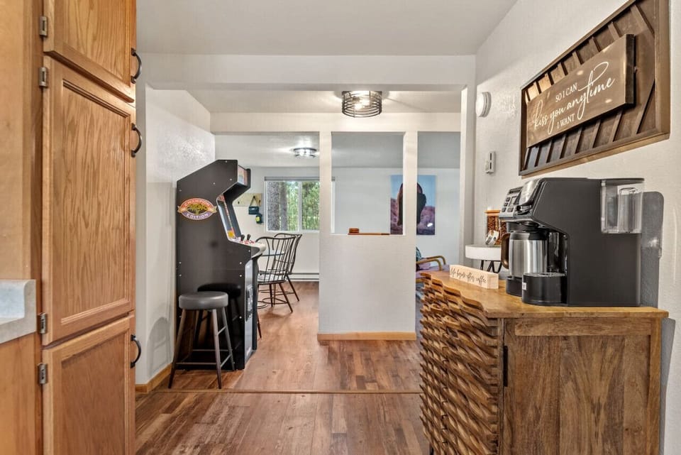 Off to the main area is the fully-stocked kitchen.