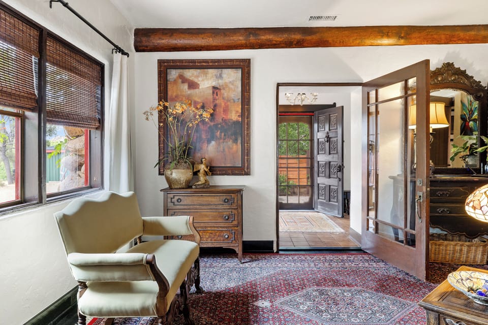 Step into this unique and charming living space, where the elegance of a bygone era meets modern comfort. Experience an inviting atmosphere that promises excitement and warmth, welcoming you to relax and enjoy.