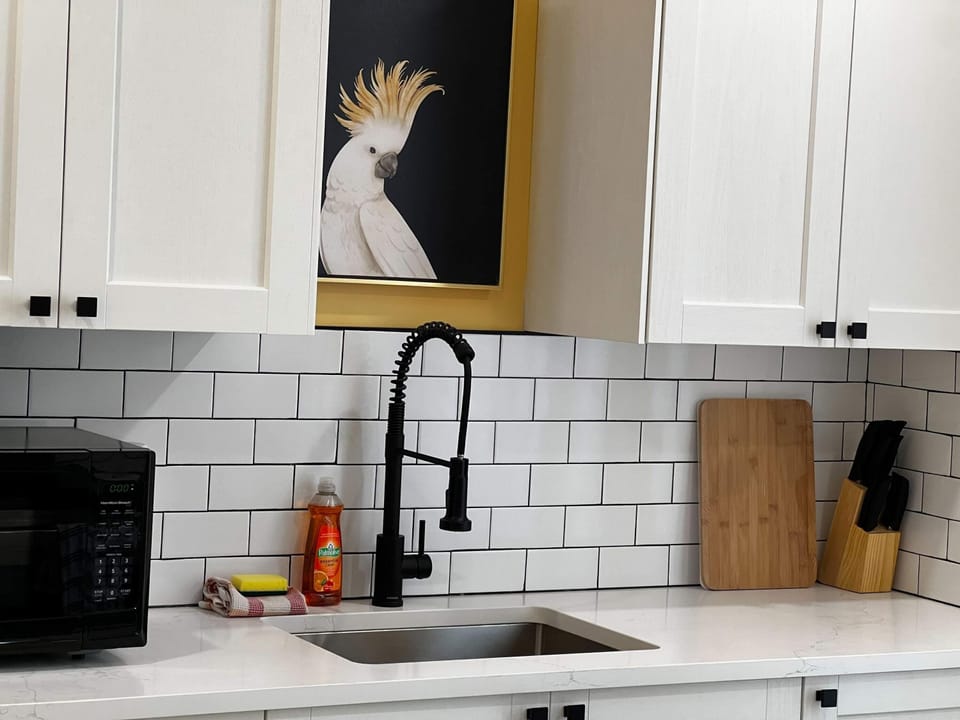 This kitchen is fully equipped and full of charm.