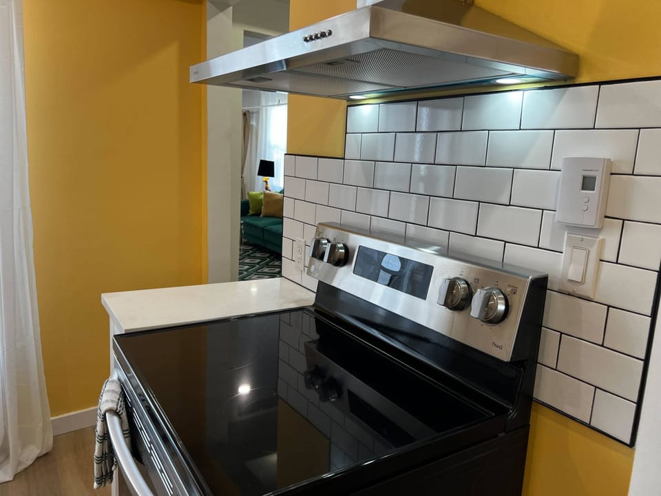 Well-stocked kitchen with sunny yellow charm