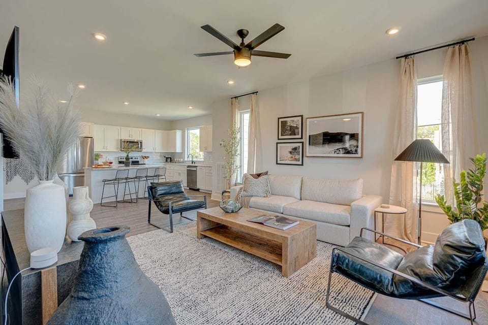 Light and Bright living room featuring flat-screen SMART TV and designer furnishings.