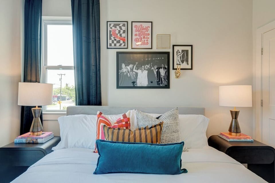 4th bedroom with King bed, designer furnishings, closet, and en-suite bathroom.