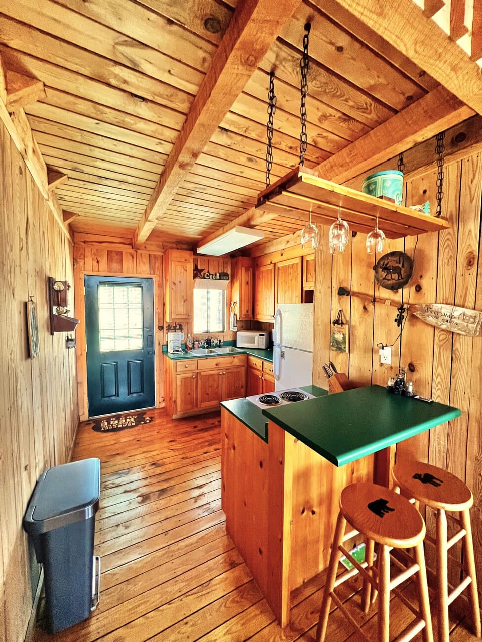 Bar in kitchen with two barstools