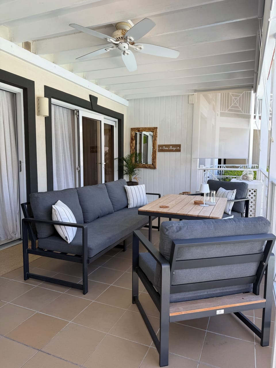    Spacious covered terrace perfect for morning coffee and evening drinks