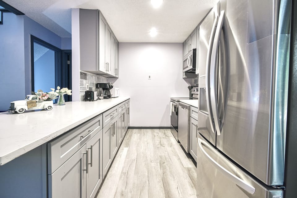 Indoors, Kitchen, Floor, Refrigerator, Microwave