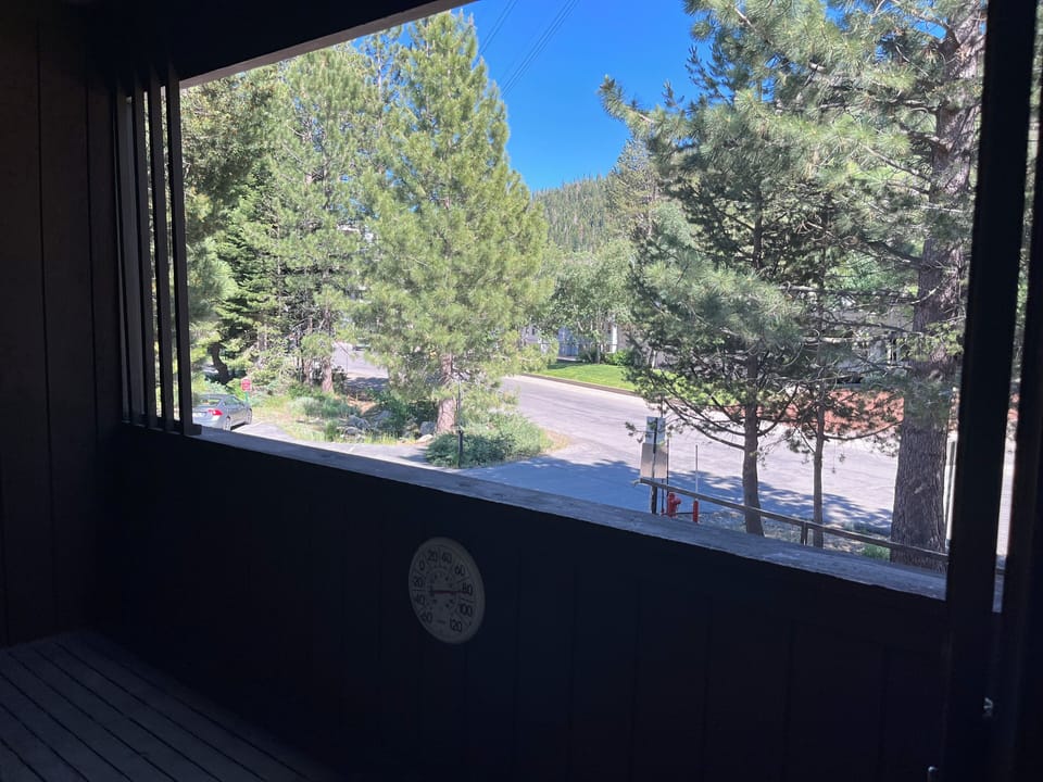 Summer view from condo with free parking below.  Short walk to village center.