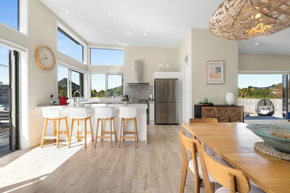 Open plan dining and kitchen with breakfast bar