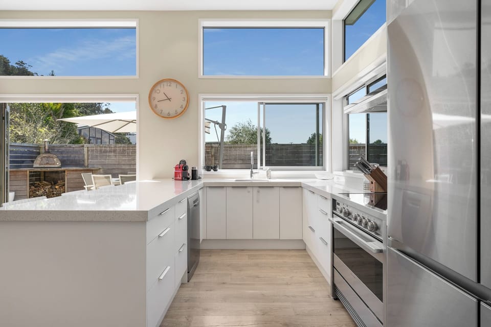 A modern, well equiped kitchen with beautiful views