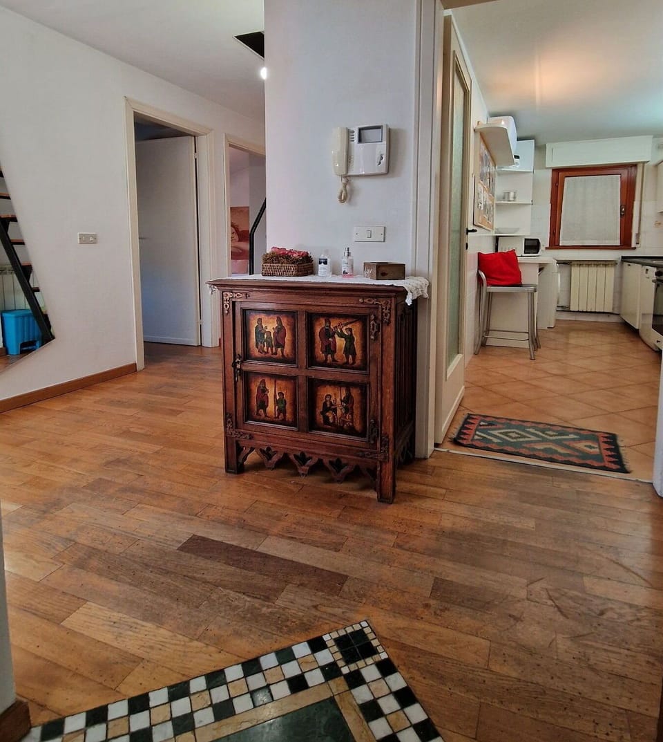 Hallway of a charming sea view apartment near the beach of Viareggio.