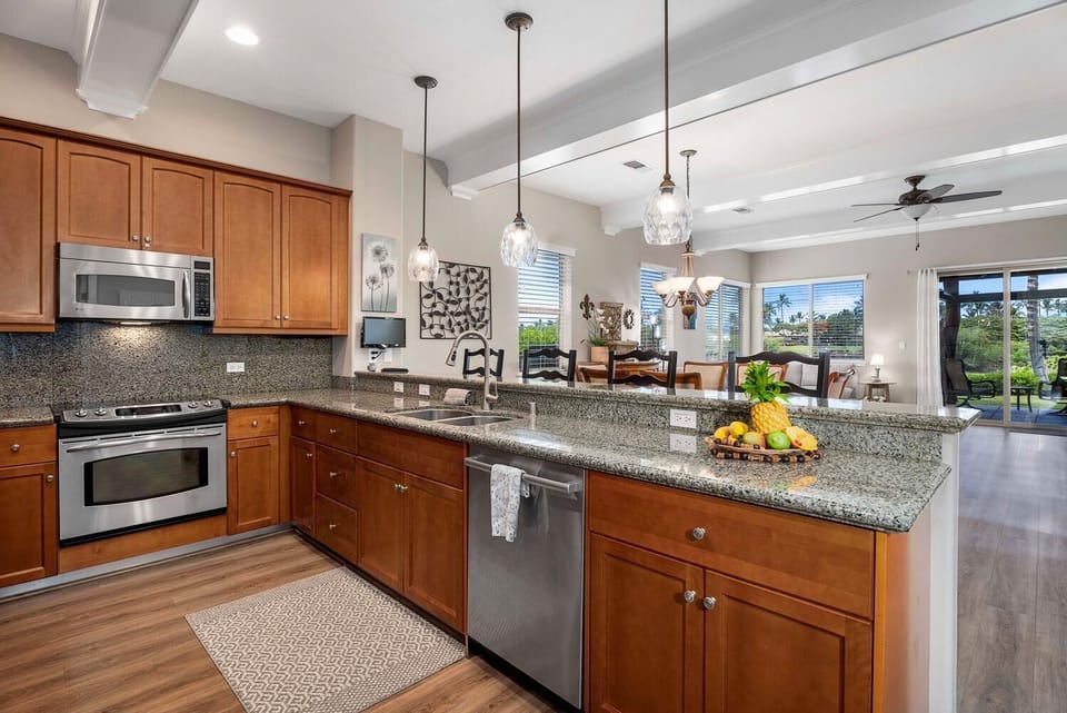 The stylish kitchen has plenty of counter space and storage.