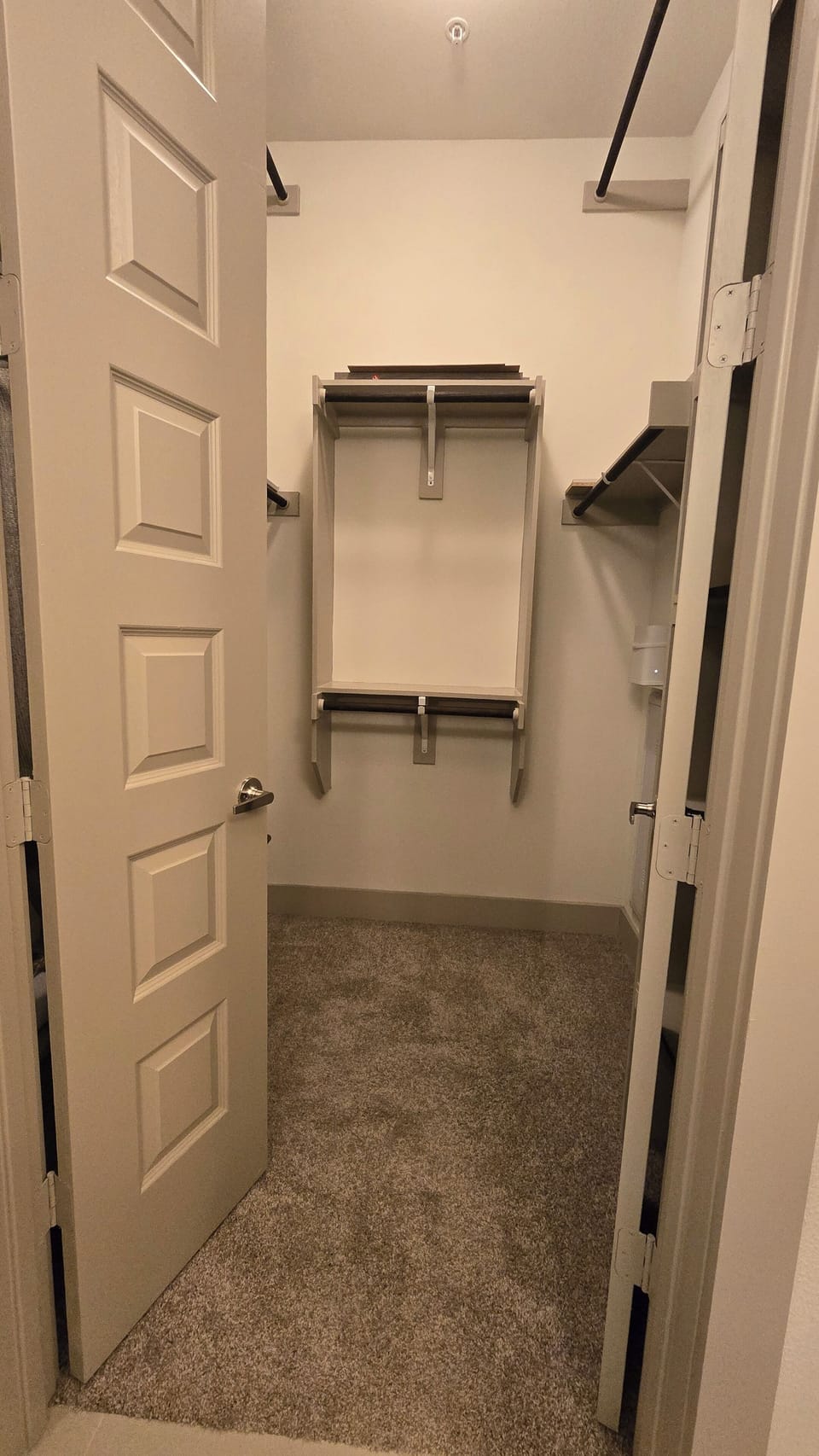 Walk-in closet in bathroom 
