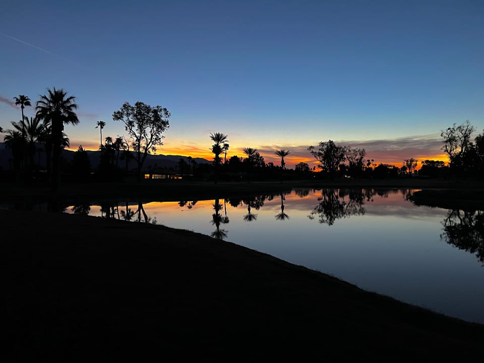 Sunrise view of the lake on golf course 