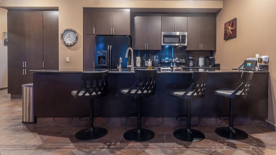 Kitchen with bar stools