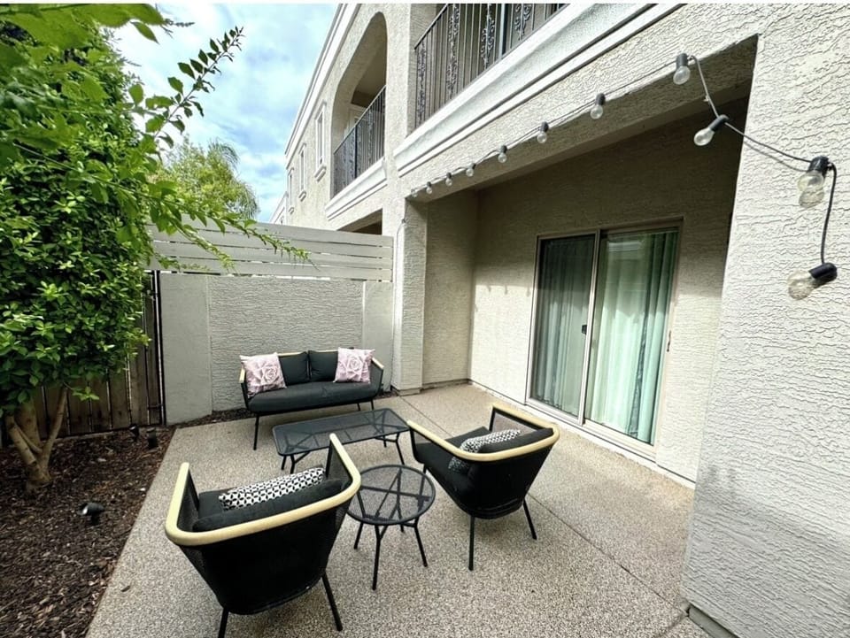 Spacious patio with access from kitchen and office.