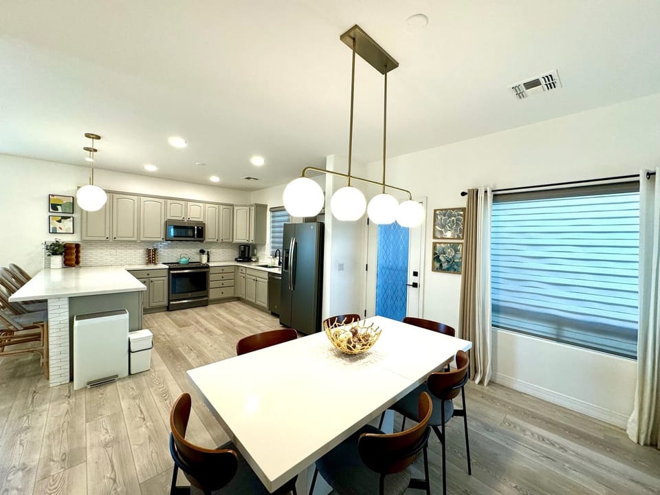 Dining Table with access to Kitchen and Patio