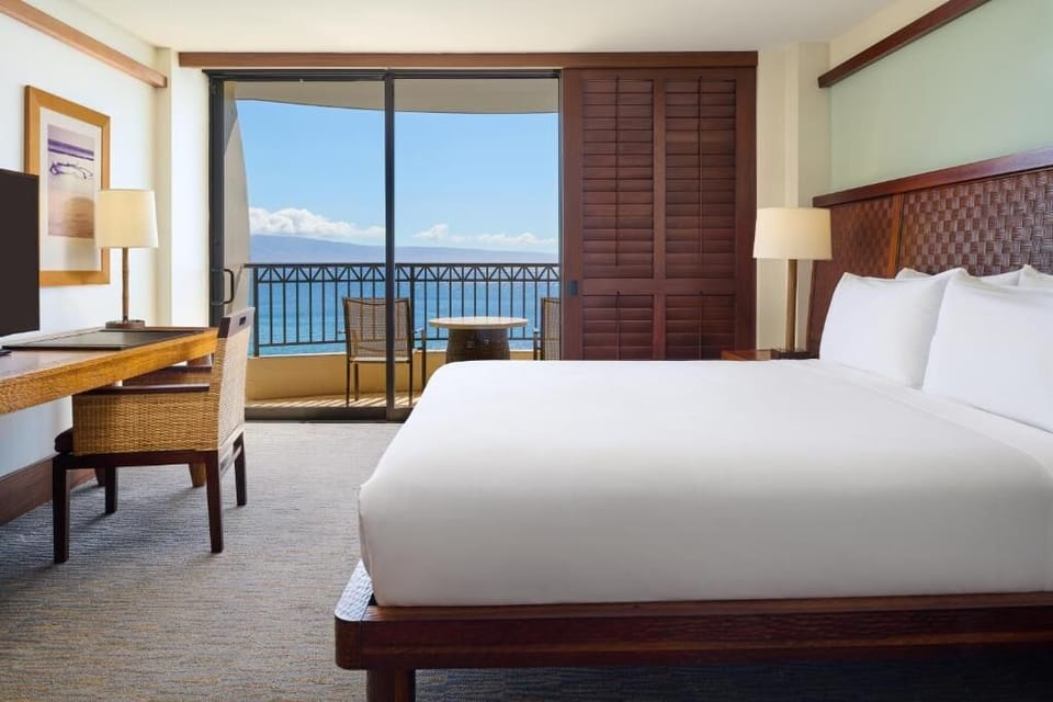 Wake up to ocean views from your plush king bed.