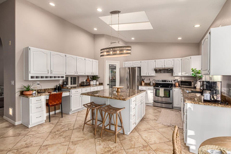 Desk, Island with Seating and Stainless Steel Appliances