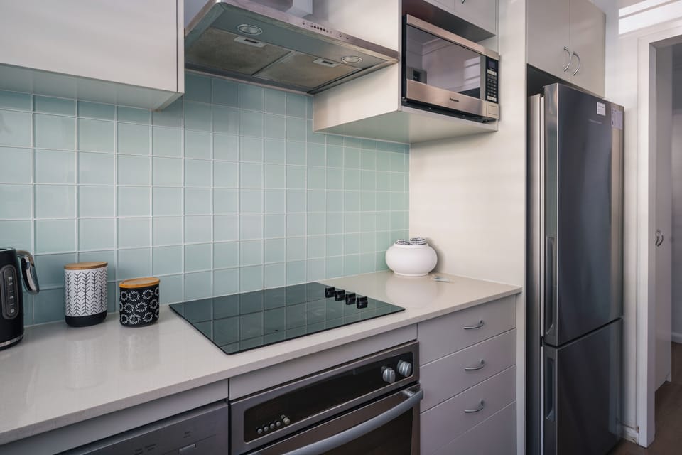 Full size fridge, microwave, oven and hotplate, dishwasher & Nespresso machine.