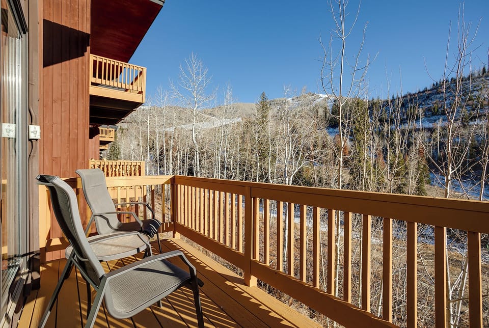 Step onto your private balcony and sink into comfortable loungers while soaking up stunning mountain views and crisp alpine air.
