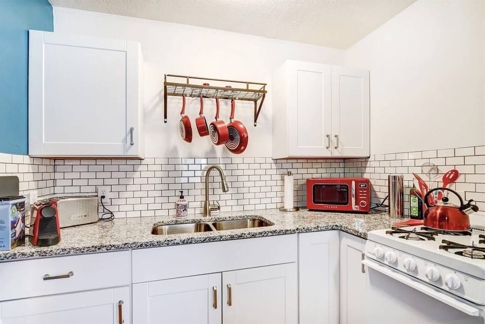 Kitchen has ample space to prepare a simple meal