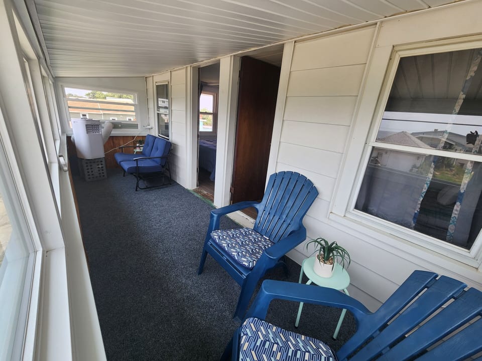 Upstairs porch- portable heat/AC window unit- Enjoy the views all year!
