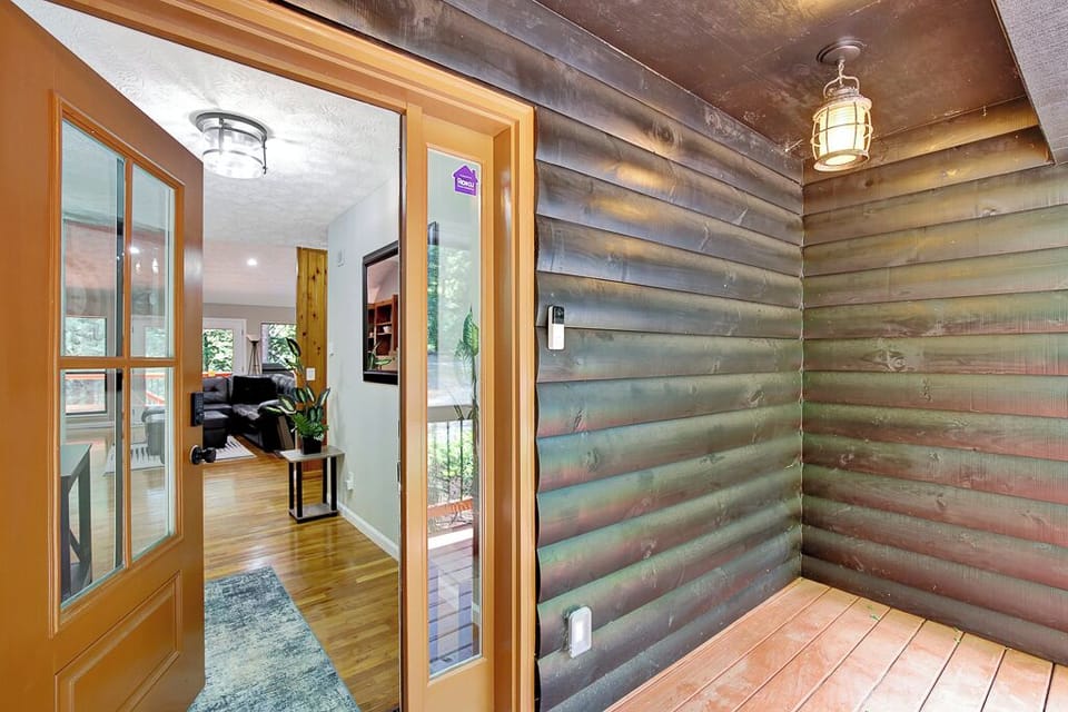 Door leading from porch into main living area.