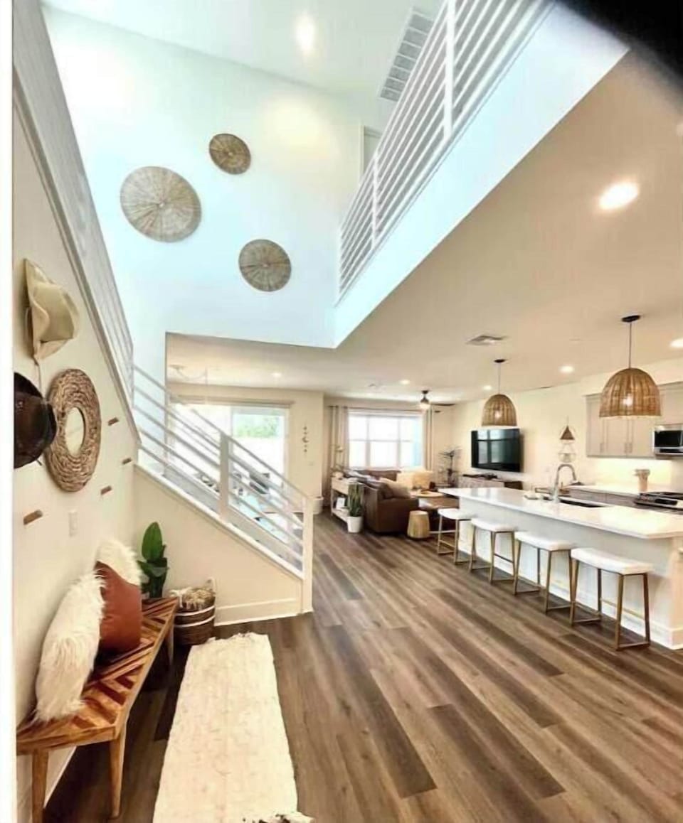 Open concept with vaulted ceilings, modern fully stocked kitchen