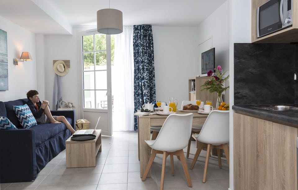 Kick back your feet and relax in the bright and cozy living area.