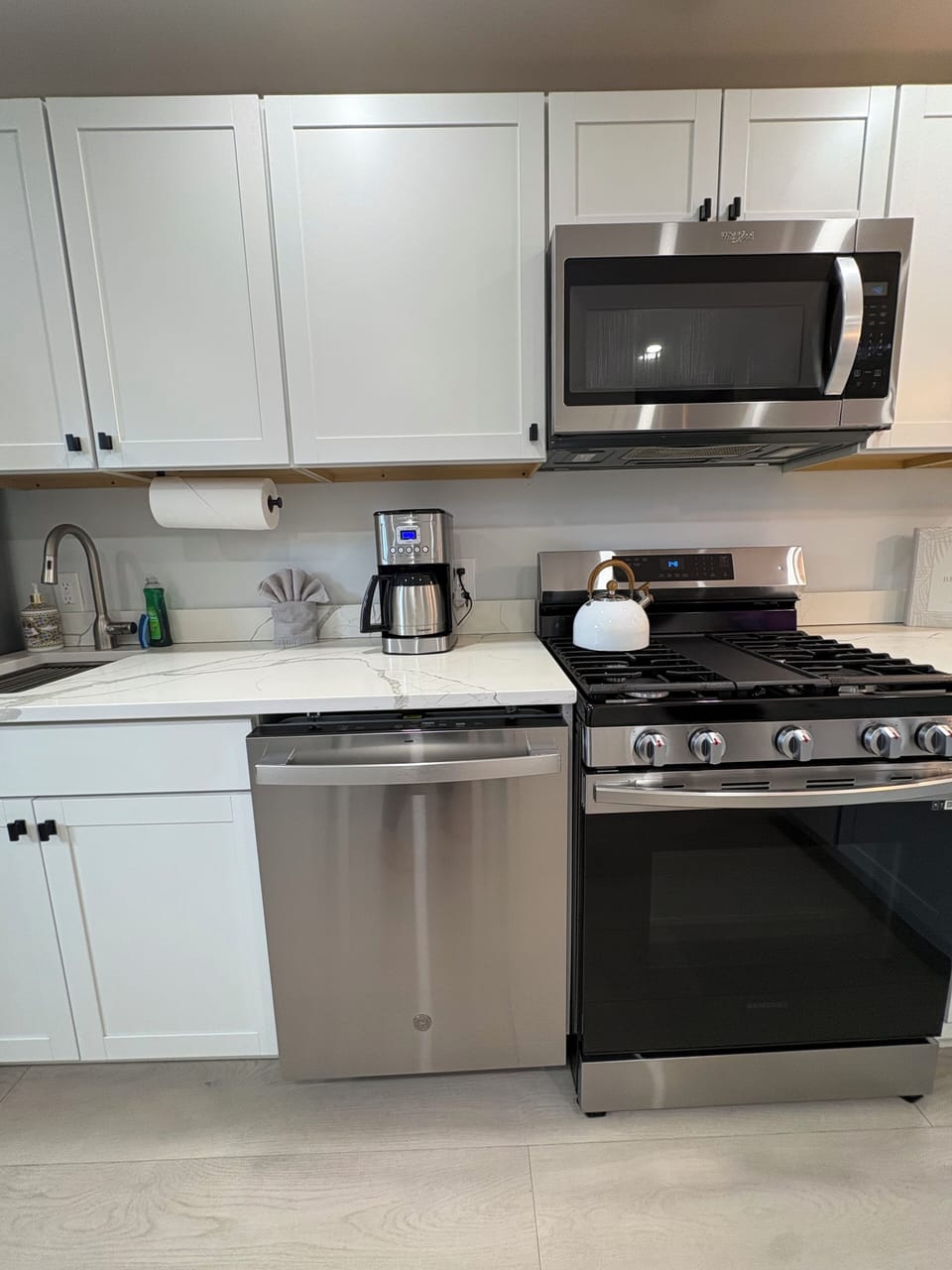 Fully equipped kitchen with stainless steel appliances 