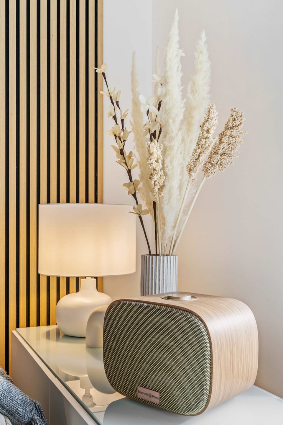 Elegant bedside setup with soft lighting and decorative touches that create a cozy, calming atmosphere for restful nights.