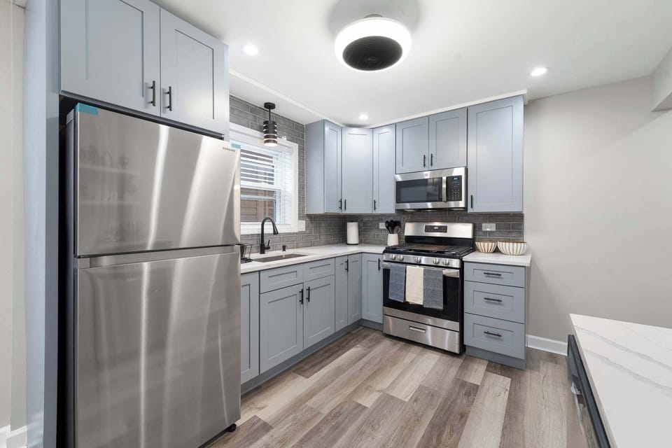 Sleek appliances and practical counter space make this kitchen easy to enjoy.