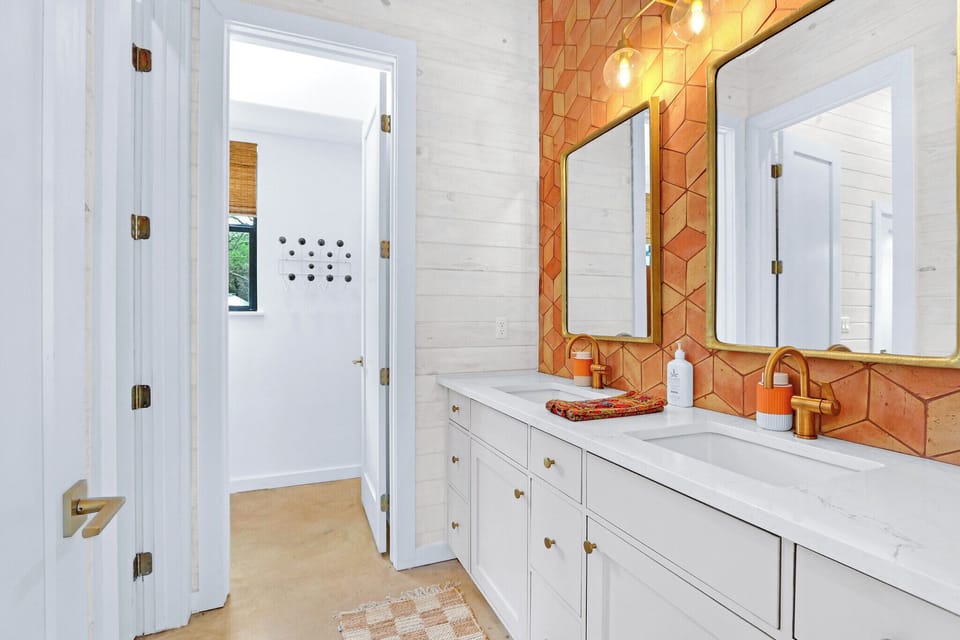At the other end of the bathroom is a closet