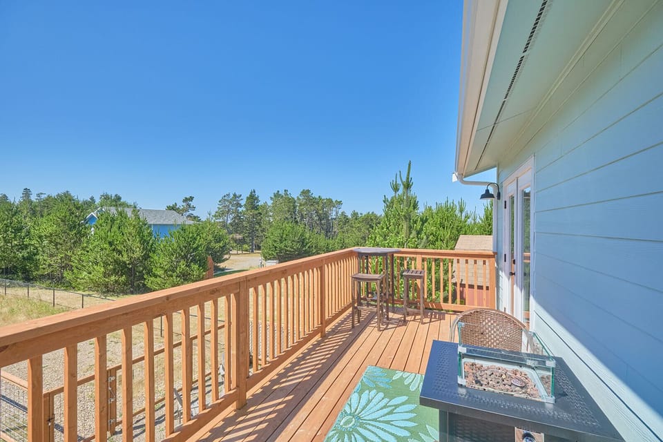 Upstairs private deck with gas fire table and seating