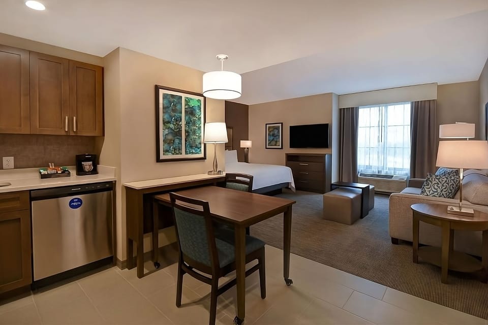 Settle in with an easy kitchenette and comfortable open layout.