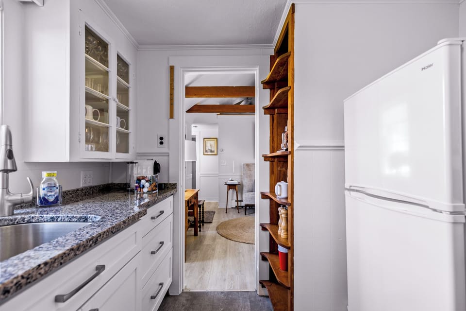 Kitchen has everything you need, including a coffee maker, toaster, and blender.