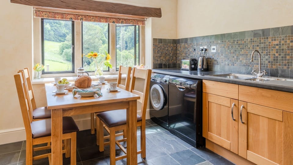 Light and airy kitchen/dining area with views of the valley