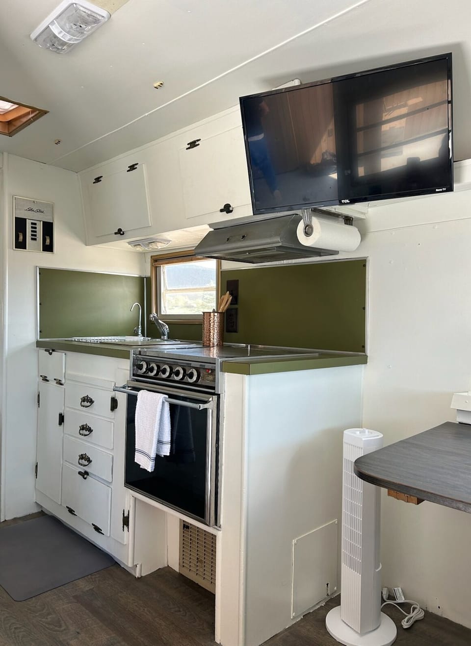 Charming and functional kitchen space.