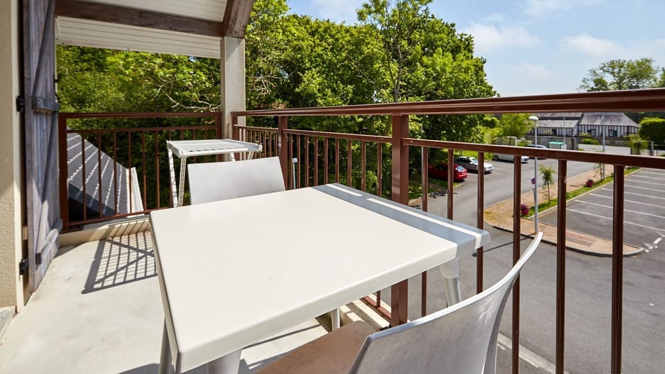 Open the door and step out onto your private balcony!