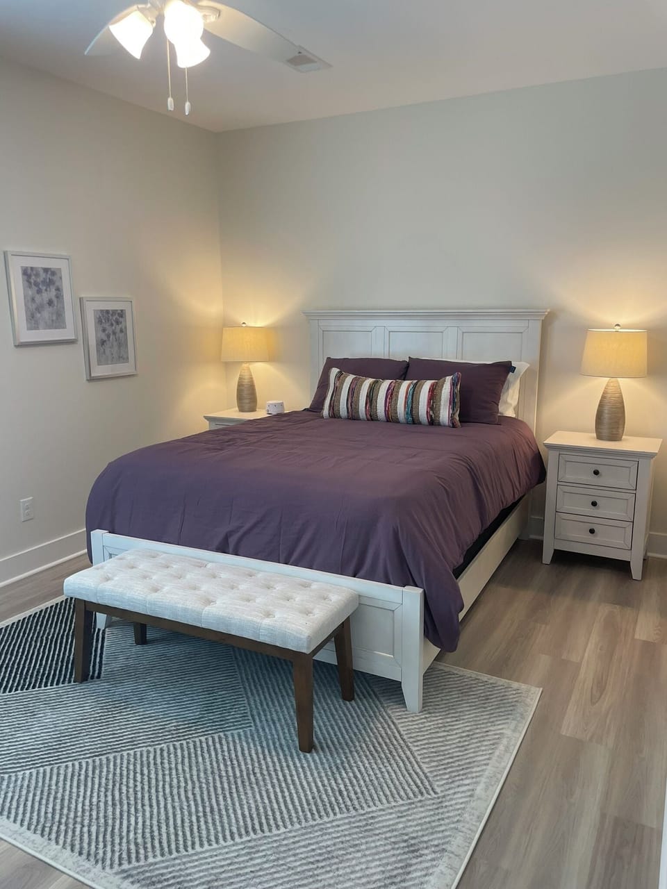 Spacious bedroom with new queen mattress.