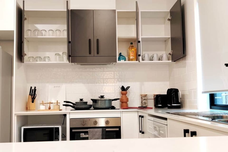 Fully stocked kitchen for that chef in the family! You will also find a glass for that special occasion!!!