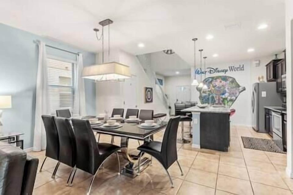 Large dining area table attached to updated kitchen