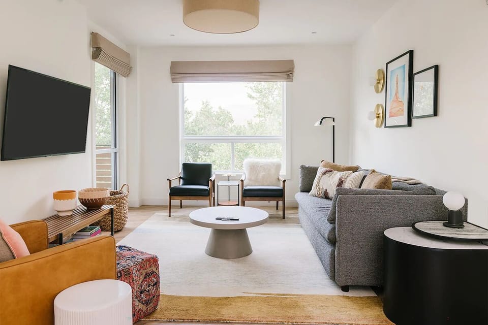Unwind on the plush sofa for a cozy movie night.