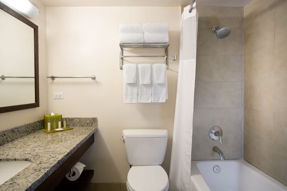 Refresh easily with a clean bath and roomy shower-tub.