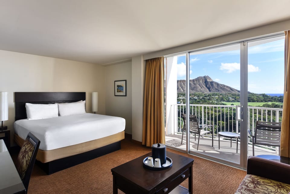 Wake up to iconic mountain views through wide glass doors.