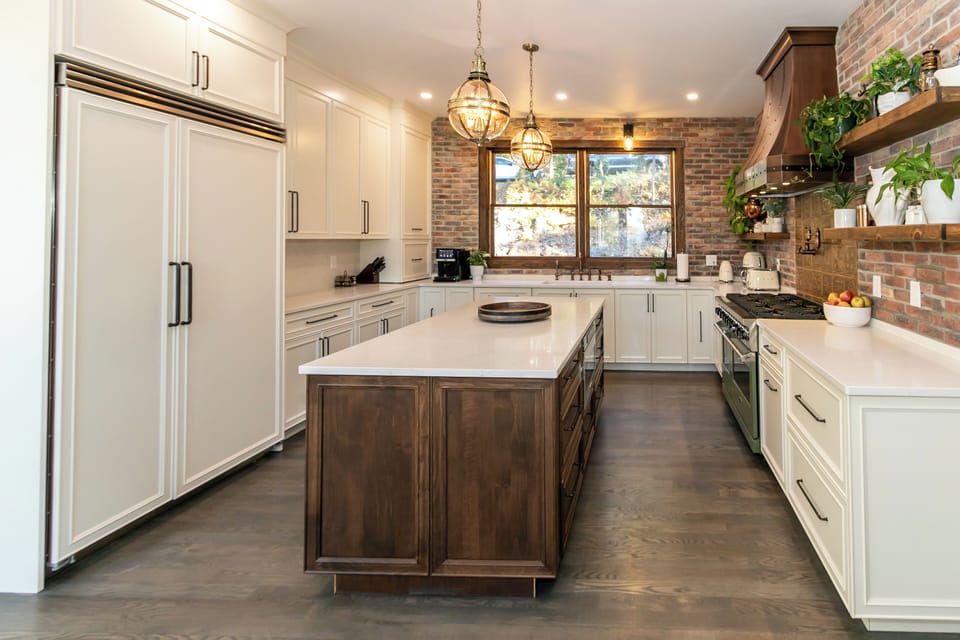 Kitchen features 48" custom fridge. 