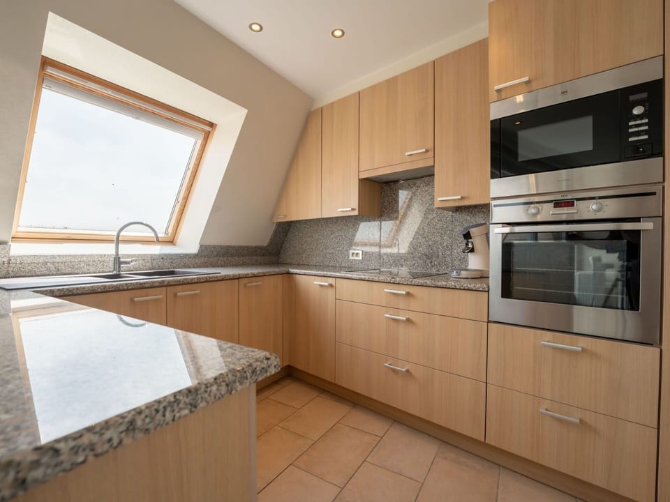 Cabinetry, Countertop, Furniture, Property, Kitchen Sink, Building, Tap, Kitchen Stove, Kitchen, Window