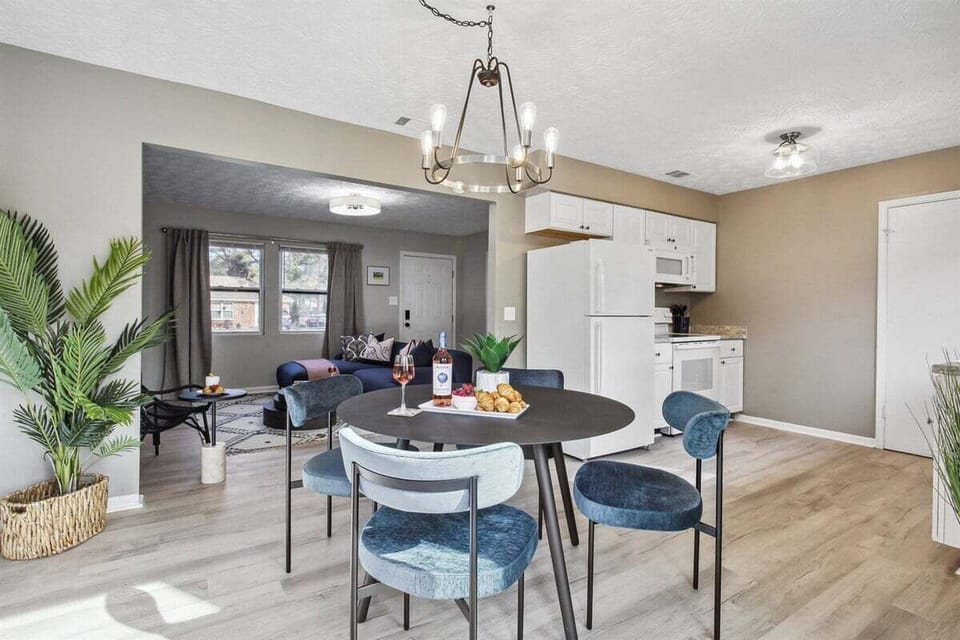 Gather, graze, or game—this charming dining area is ready for whatever your crew has planned.