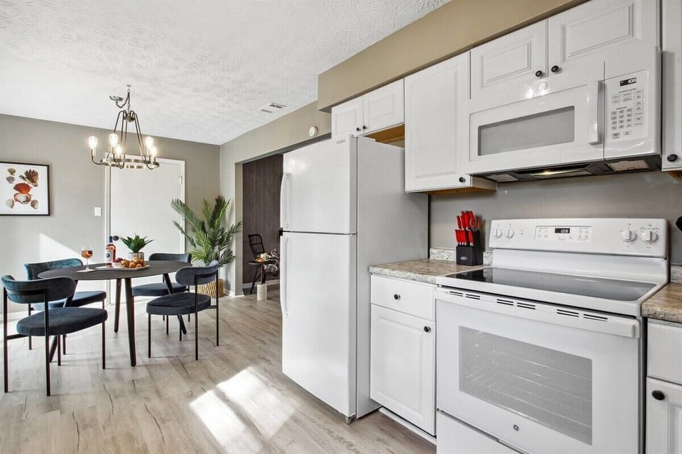 Whip up something delicious in the kitchen while enjoying full views of the dining area and the backyard—so you're never far from the fun.