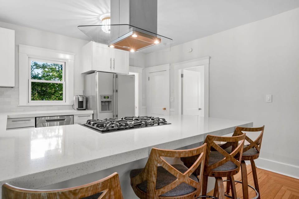 Bright, sleek kitchen with breakfast bar - 232 Wood Road South Yarmouth Cape Cod - Cape State of Mind - NEVR