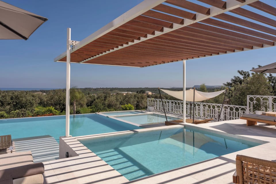 Red Bliss Villa invites you to indulge in a luxurious stay featuring a super-large 160 sqm ecological saltwater pool, thoughtfully designed with multiple sections to suit every guest